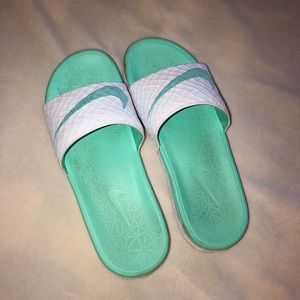 Teal Nike slides